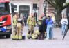 Meisje met voet tussen de spaken
